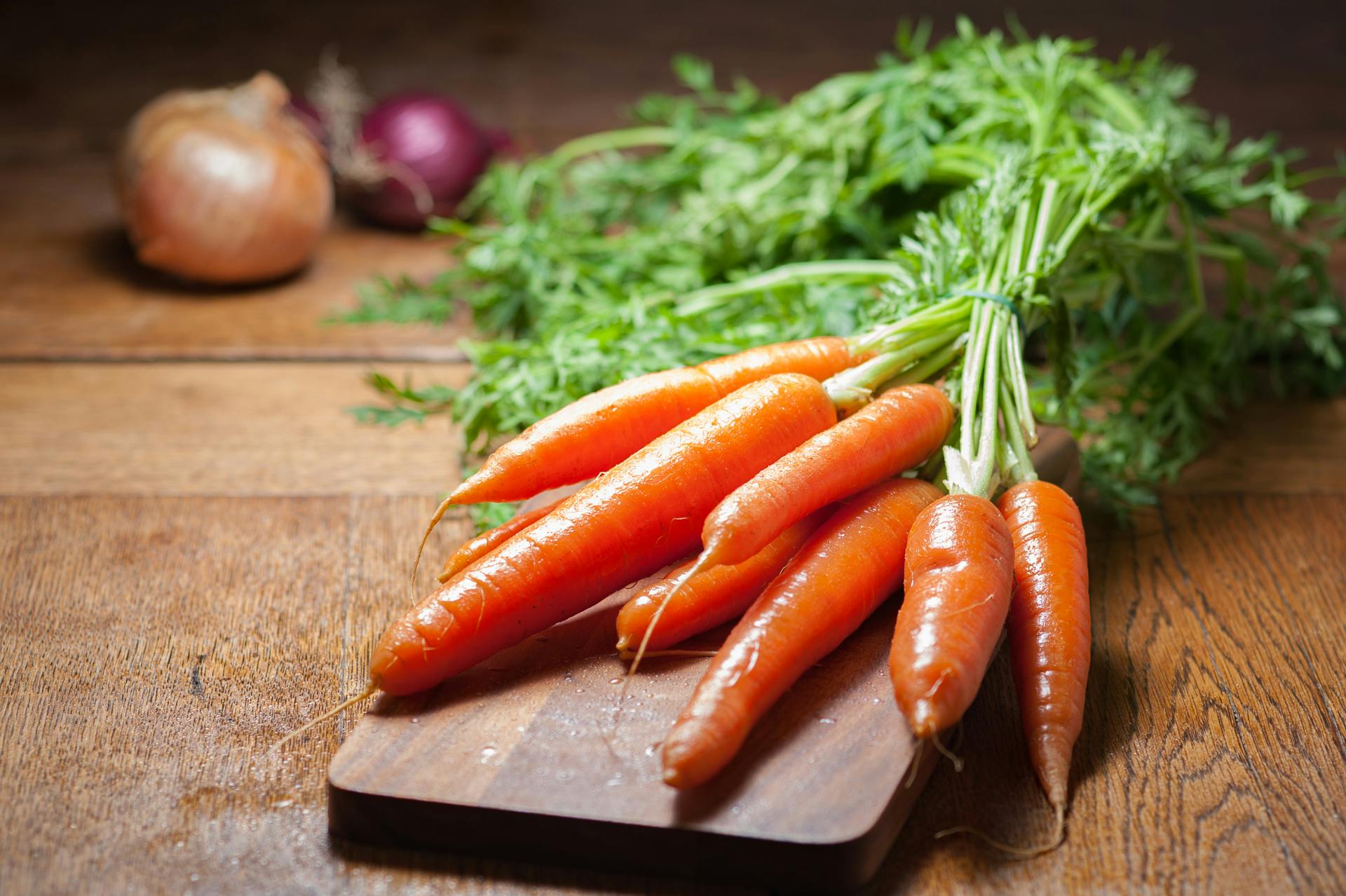 8 Piece of Carrot on Brown Chopping Board